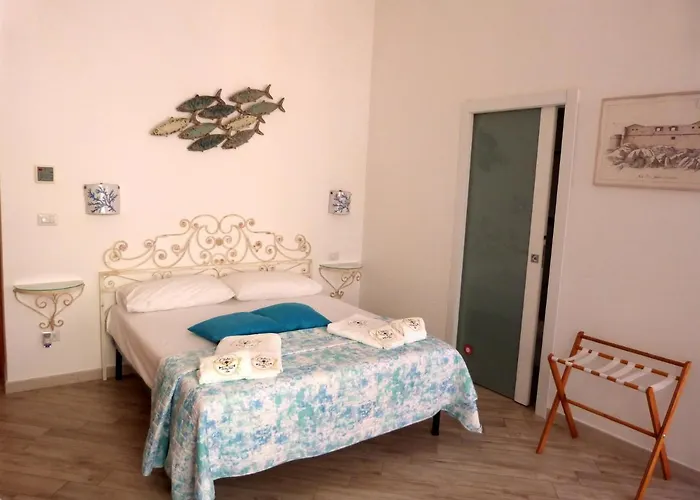 Clelia's Boutique & 4* Ла-Маддалена